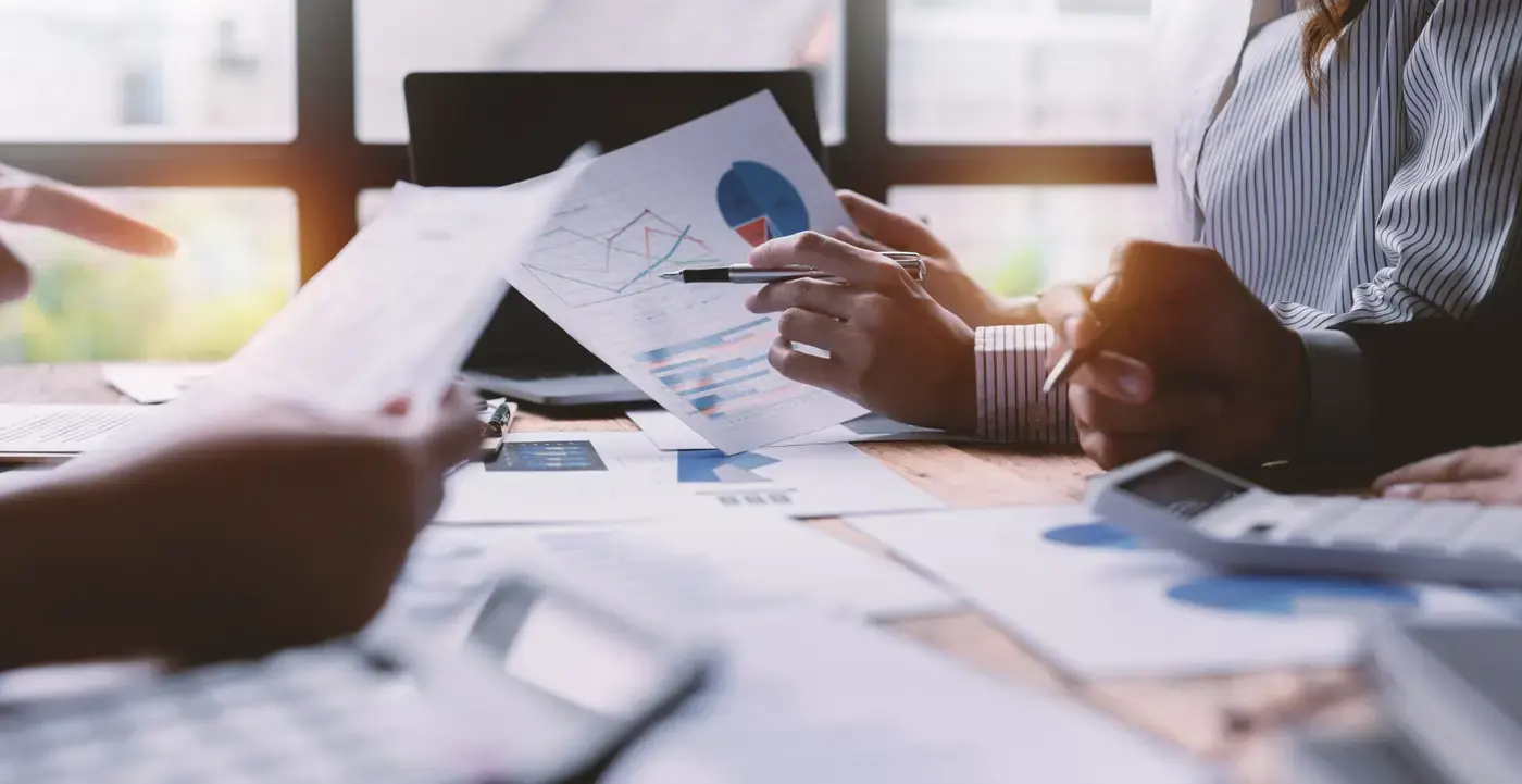 Carrier and broker reviewing a freight agreement